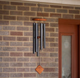Chimes Of Pluto - Black Teak